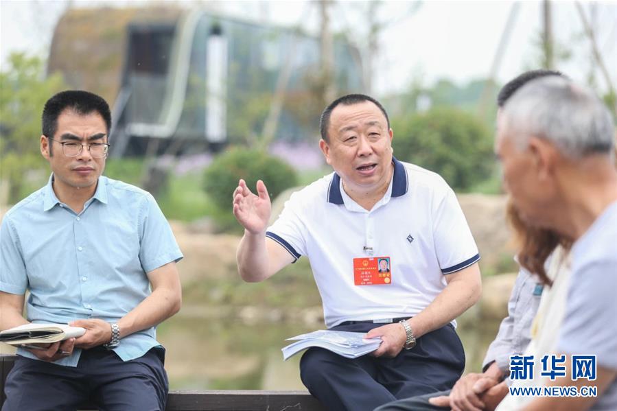 （新華全媒頭條·兩會精神看落實·圖文互動）（2）整體謀劃、系統(tǒng)升級、全面提升——落實全國兩會精神織牢織密公共衛(wèi)生防護(hù)網(wǎng)